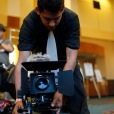 Multimedia editor Eliezer Diaz records video inside the Convention Center of the Marriott Hotel in Burbank, Calif. during the JACC 2014 State Conference. Photo: Nelger Carrera